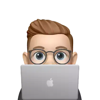 Memoji of me sitting at a computer